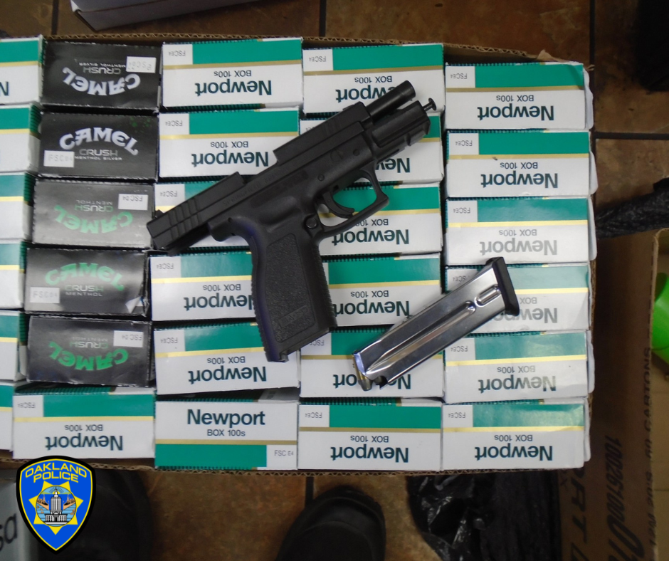 Photo of a loaded firearm and cartons of unlawful tobacco products from out-of-state