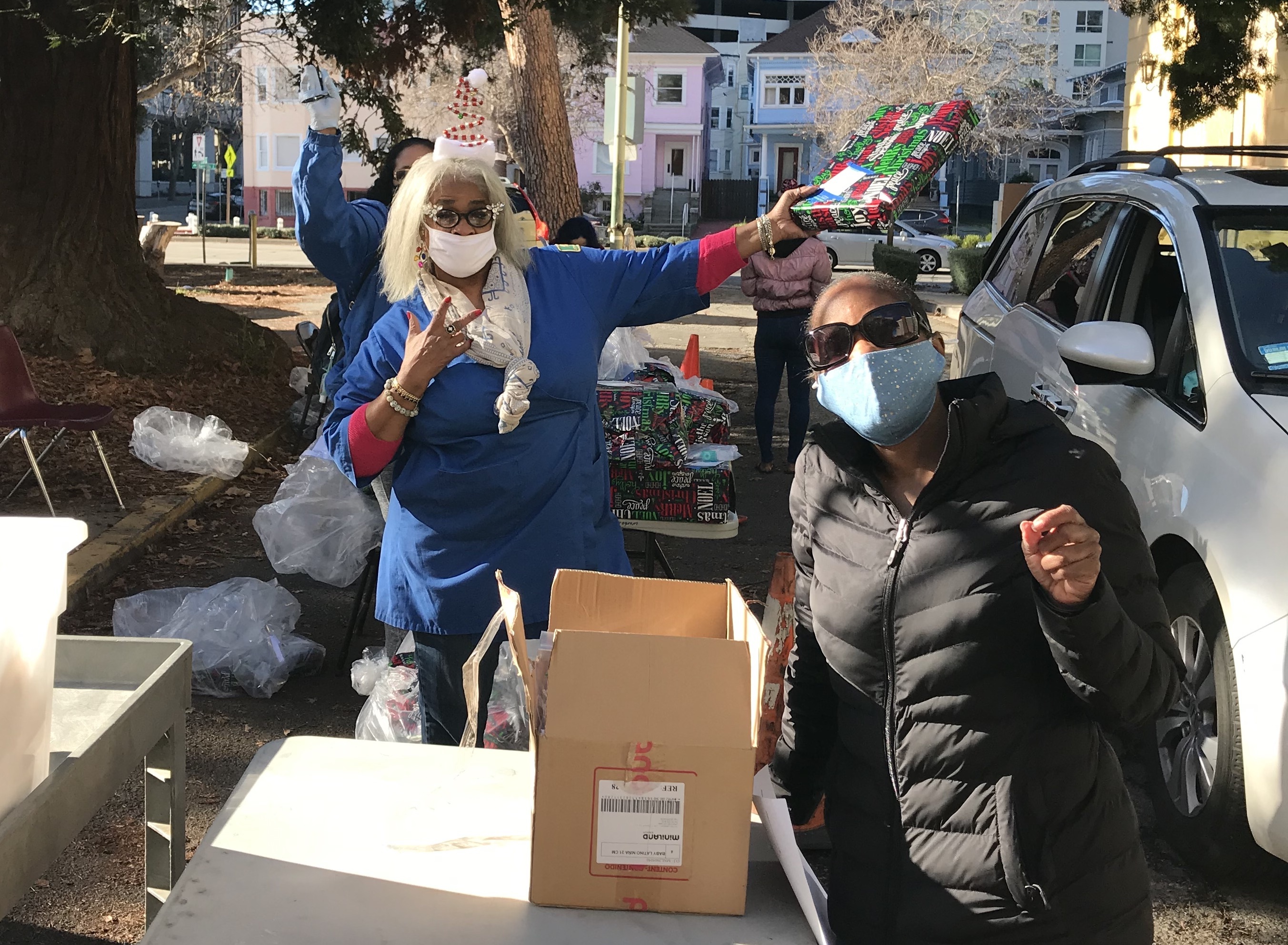 Photo of Head Start staff distributing gifts