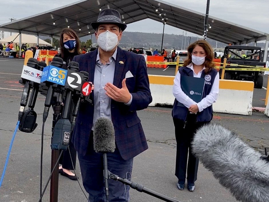 Vice Mayor Kaplan, wearing a mask, at the press conference for the FEMA-supported large scale COVID vaccination project - headquartered at the Oakland Coliseum