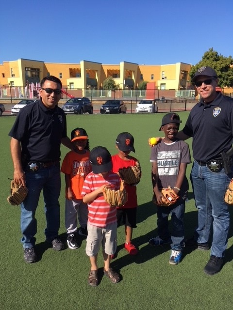 Officers Millan Estrada Cach Volunteer Baseball