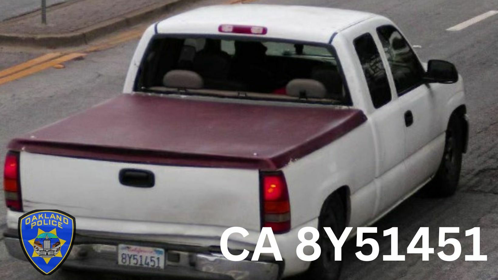 Photo of a white Chevy Pickup Truck, with a red cover on the bed.  California license plate 8Y51451